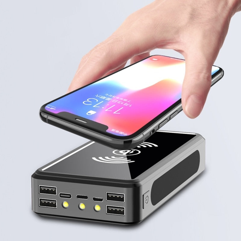 Stay Powered Anywhere with our 80000mAh Wireless Solar Powerbank! Fast Charge your Devices with 4 USB Ports. A Large Capacity Mobile Phone External Battery Poverbank for Smartphones
